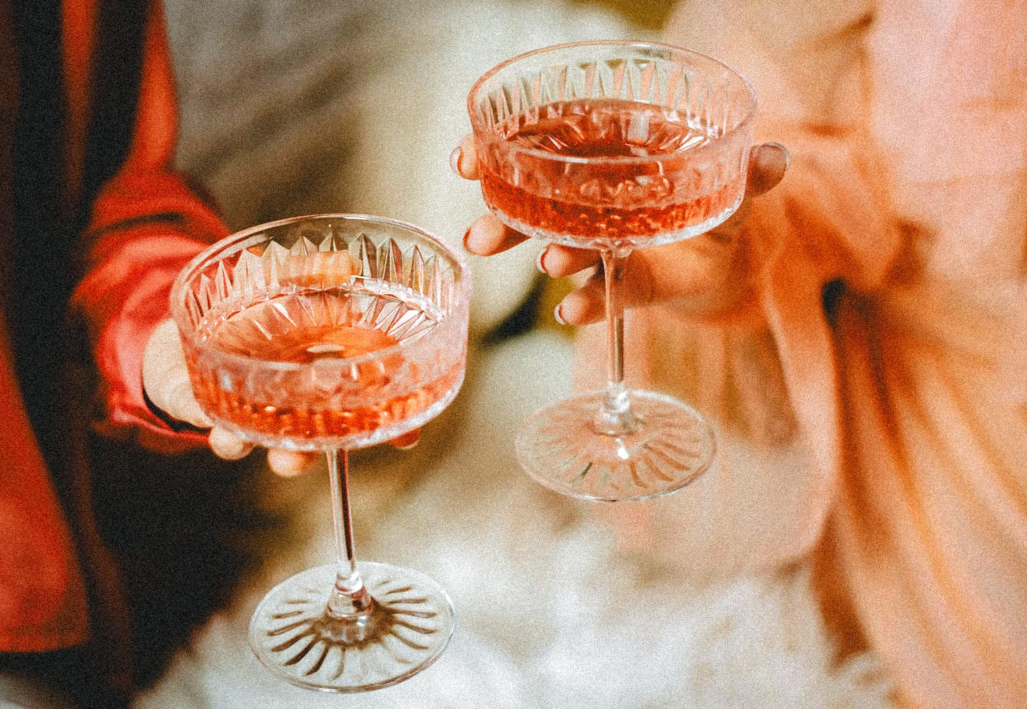 toasting in champagne glasses